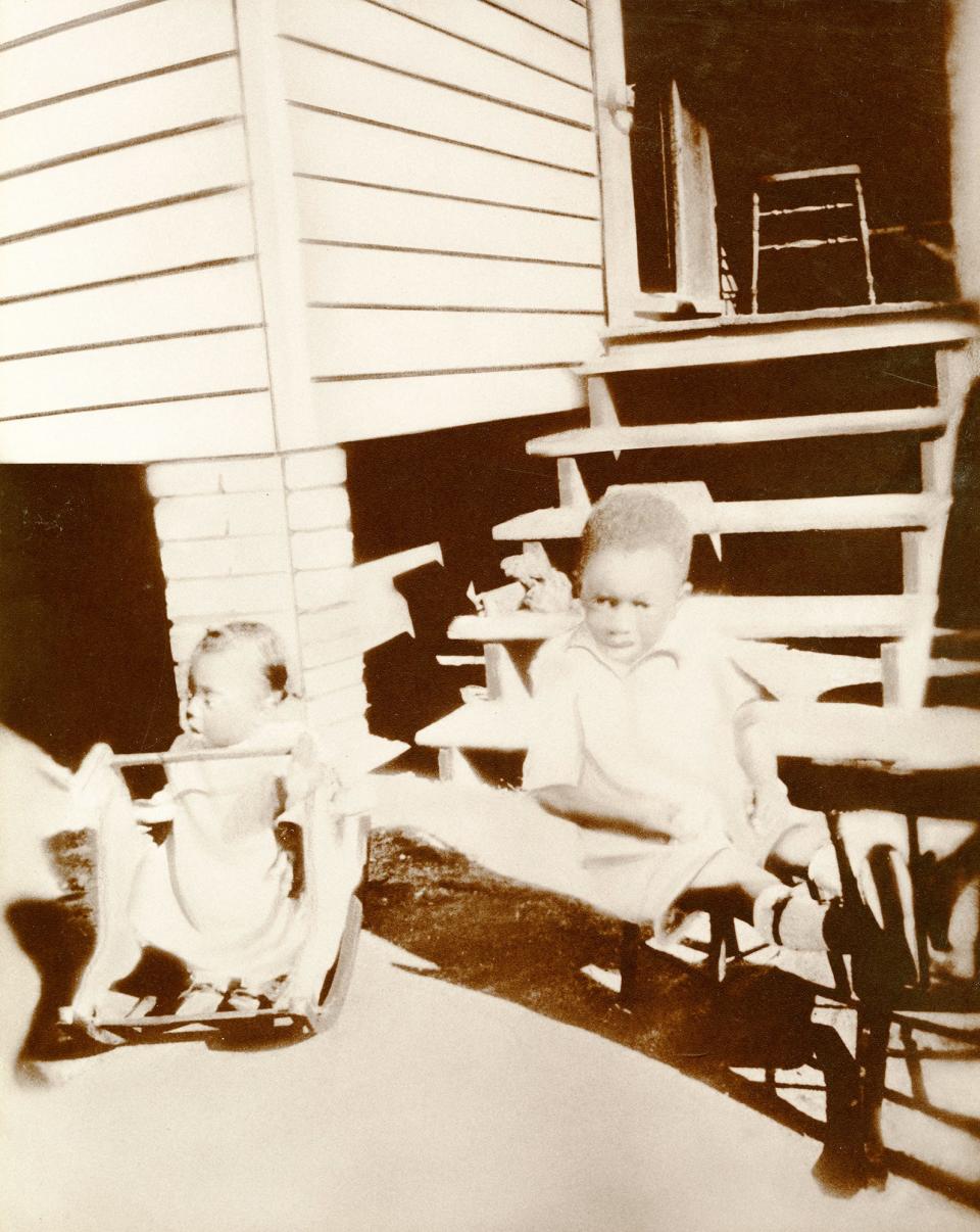 W. W. Law and his sister Dorothy. Photograph was found in an envelope; written on the envelope: 1926, Westley age 4, Dorothy age 3.