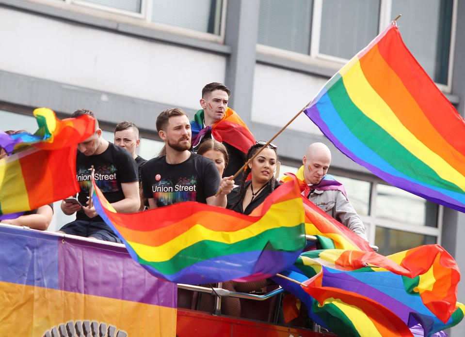 Revelers take part in Belfast Gay Pride parade