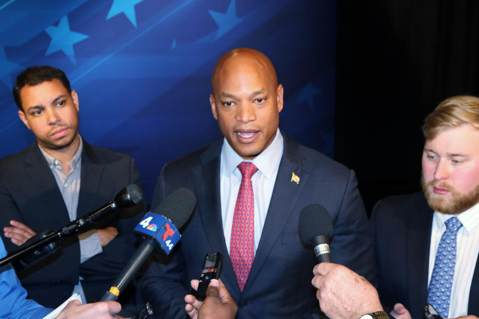 Gubernatorial candidate Democrat Wes Moore talks to reporters after a debate with his opponent Republican Dan Cox, Wednesday, Oct. 12, 2022 in Owings Mills, Md. Moore, who has held double-digit leads over Cox in recent polls, is running to regain the governor's office for Democrats in a state where Democrats outnumber Republicans 2-1. Republican Gov. Larry Hogan is term limited. (AP Photo/Brian Witte)