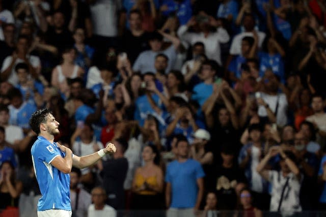 Napoli's Khvicha Kvaratskhelia celebrates after scoring his team's second goal in their 3-0 Serie A win against Bologna.