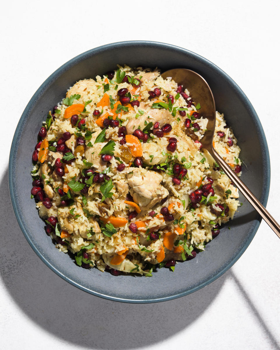 This image released by Milk Street shows a recipe for plov, a hearty pilaf, with chicken. (Milk Street via AP)