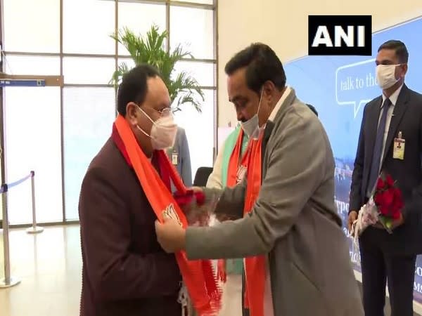 Gujarat CM Vijay Rupani welcoming BJP president JP Nadda on Ahmedabad airport (Photo/ANI)