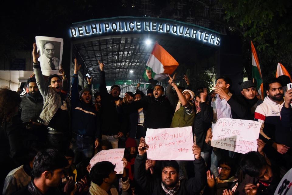 Demonstrators shout slogans outside the Delhi Police Headquarters to protest following alleged clashes between student groups at Jawaharlal Nehru University (JNU) in New Delhi on January 5, 2020. - At least 23 people were hurt at a prestigious Indian university on January 5 in what police said were clashes between rival student groups. The incident at JNU is the latest in a series of violent clashes and protests at different Indian universities in the last few weeks, with many student activists and opposition demonstrating against Modi government's controversial new citizenship law. (Photo by STR / AFP) (Photo by STR/AFP via Getty Images)