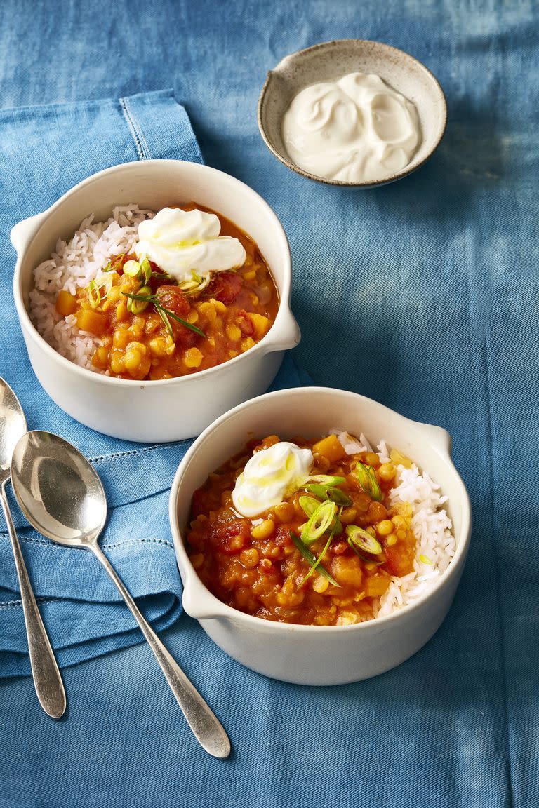 <p>The best thing about this recipe is that after prep, you can turn on your slow cooker and forget about it the rest of the day. Top the stew off with rice, a dollop of yogurt, and a lemon-scallion drizzle. Yum. </p><p><em>Get the <a href="https://www.womansday.com/food-recipes/food-drinks/recipes/a60510/curried-butternut-squash-stew-recipe/" rel="nofollow noopener" target="_blank" data-ylk="slk:Slow Cooker Curried Butternut Squash Stew recipe;elm:context_link;itc:0;sec:content-canvas" class="link ">Slow Cooker Curried Butternut Squash Stew recipe</a>.</em></p>