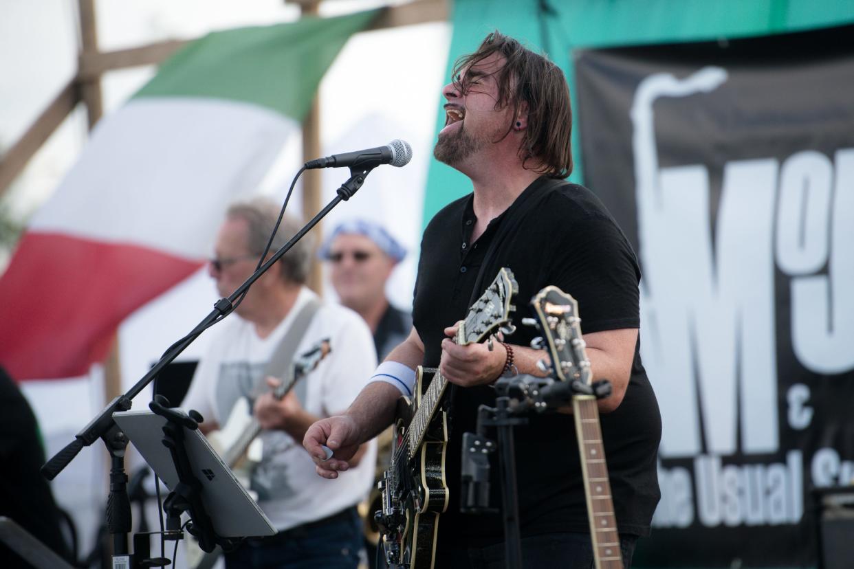 Mojo Dia and the Usual Suspects shown performing during the annual San Rocco Festa behind the Beaver Valley Mall in Center Township.