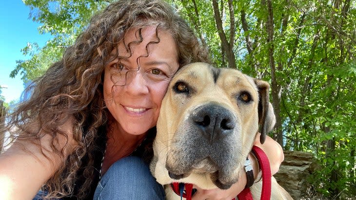 Mattie Allen with Porky, a mother of seven who survived the Camp Canyon-Hermit's Peak fire