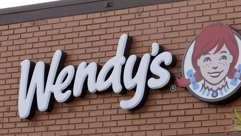 This Friday, Aug. 11, 2017, photo shows a Wendy’s sign at a restaurant in Miami. 