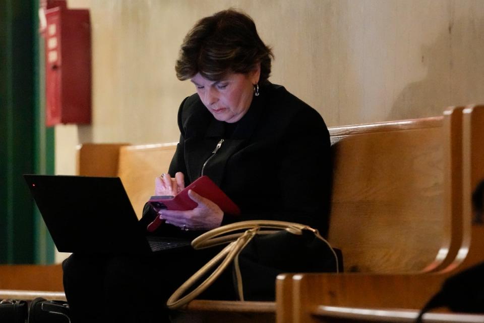 Attorney Gloria Allred works on her laptop outside a Manhattan criminal courtroom Wednesday May 1 2024 in New York. Harvey Weinstein is due back in a New York courtroom for the first time since his 2020 rape conviction was overturned by an appeals court last week (AP)
