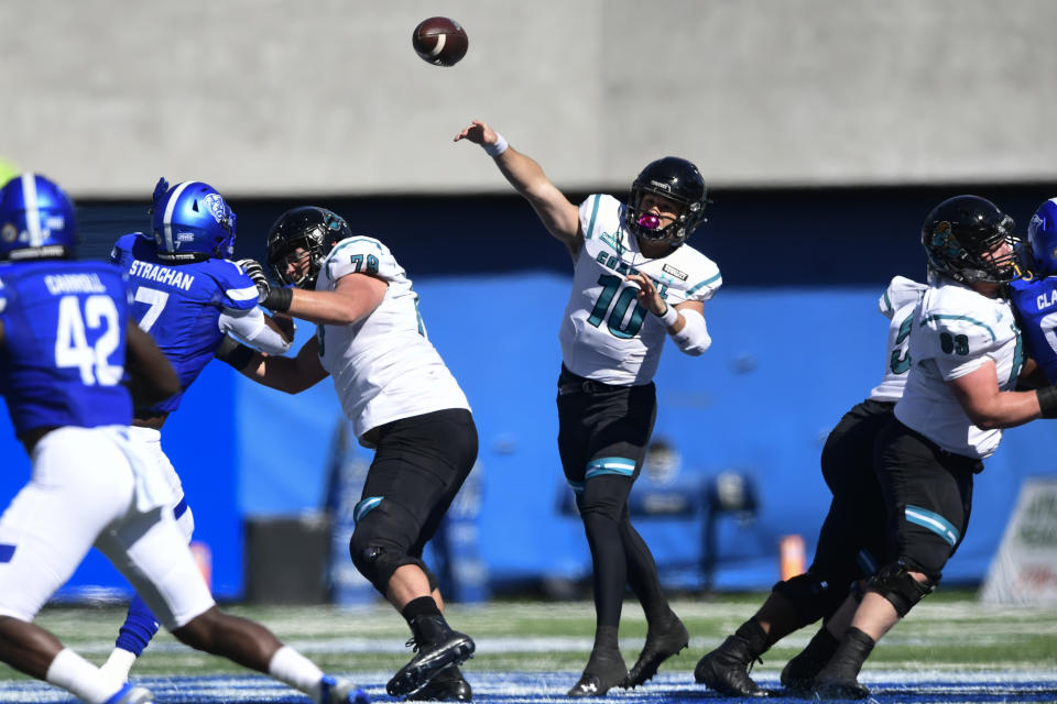 Coastal Carolina quarterback Grayson McCall passes against Georgia State during the second half of an NCAA football game Saturday, Oct. 31, 2020, in Atlanta. Coastal Carolina won 51-0. (AP Photo/John Amis)