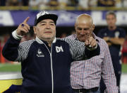 Diego Maradona in one of his final public appearances, acknowledging the fans at the start of the Argentina First Division match between his childhood club Boca Juniors and Gimnasia La Plata. (PHOTO: Alejandro Pagni/AFP via Getty Images)