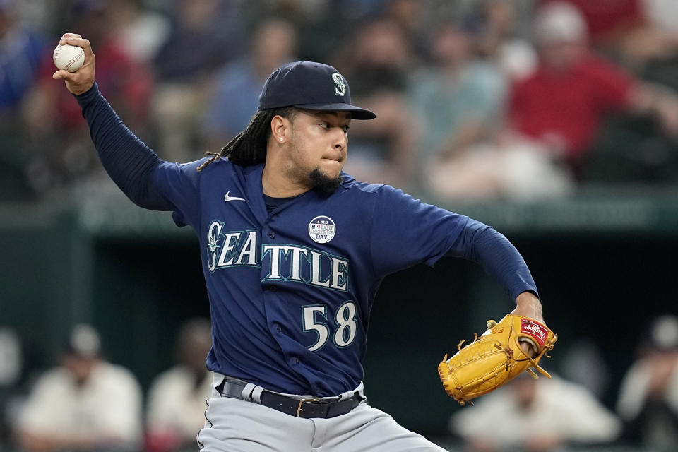 Seattle Mariners starting pitcher Luis Castillo throws to a Texas Rangers batter during the first inning of a baseball game Friday, June 2, 2023, in Arlington, Texas. (AP Photo/Tony Gutierrez)