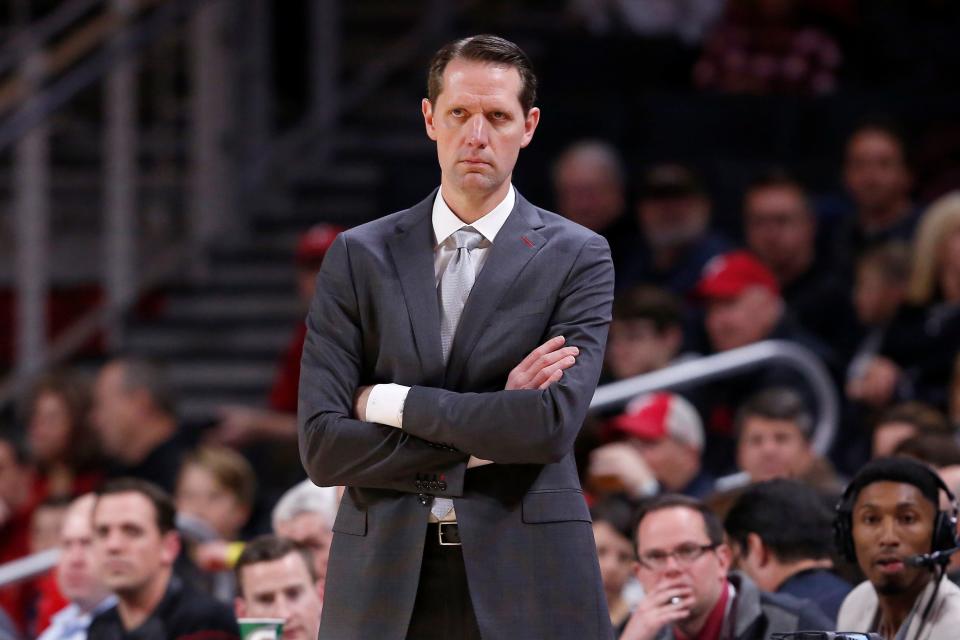 Cincinnati Bearcats head coach John Brannen watches from the sideline in the first half of the NCAA basketball game between the Cincinnati Bearcats and the Alabama A&M Bulldogs at Fifth Third Arena in Cincinnati on Thursday, Nov. 14, 2019.