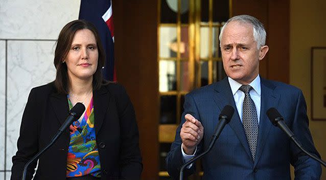 The men allegedly approached a car the volunteers were sitting in and made comments about election material. Kelly O'Dwyer  photographed with Malcolm Turnbull above. Source: AAP image.