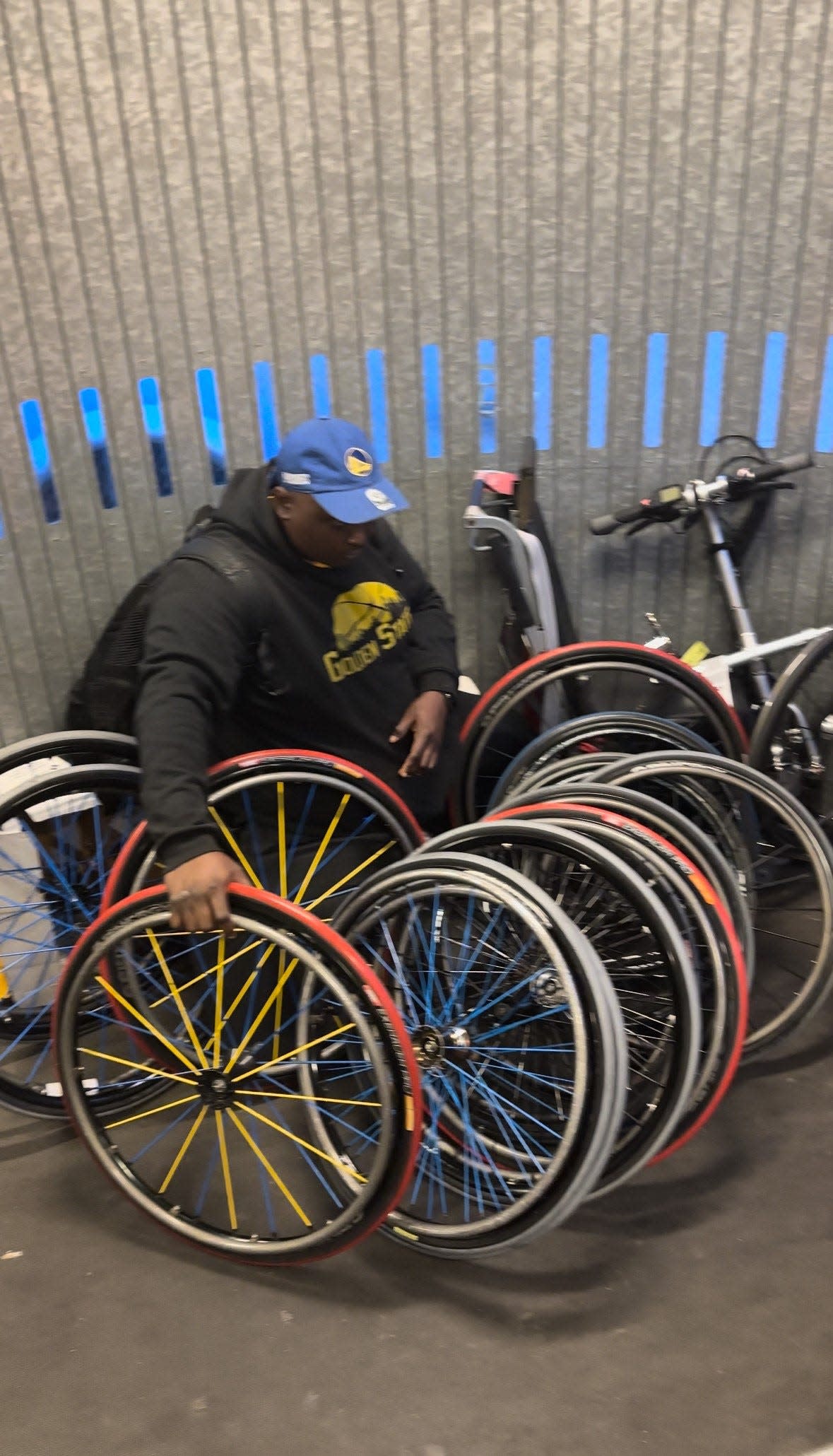 Disassembled wheelchair wheels on the jetbridge in Richmond.