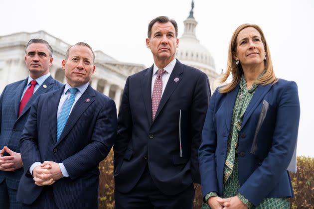 Reps. Josh Gottheimer (D-N.J.), second from left, and Mikie Sherrill (D-N.J.), right, have both said that they do not plan to challenge Sen. Robert Menendez (D-N.J.) in a primary.