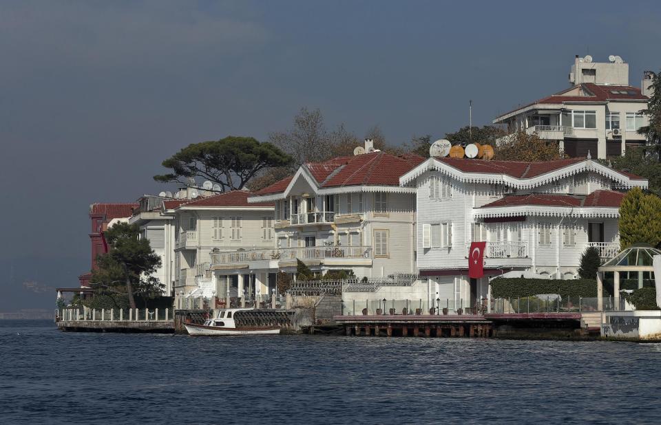 The waterside mansions, called "yali," are seen in Istanbul, Turkey, Monday, Oct. 28, 2013. Last summer, Istanbul’s Taksim Square was the scene of violent confrontations between police and protesters. But protests have faded, and contrary to some lingering perceptions, it’s quite calm now _ except for the normal hustle and bustle found in this vibrant city. And it’s as safe for tourists as it ever was. Istanbul is a thoroughly modern place, but it traces its roots back to 660 B.C. It’s the former seat of the opulent Byzantine and Ottoman empires and is divided into European and Asian sides by the Bosporus Strait, offering a wealth of history and stunning scenery. (AP Photo)