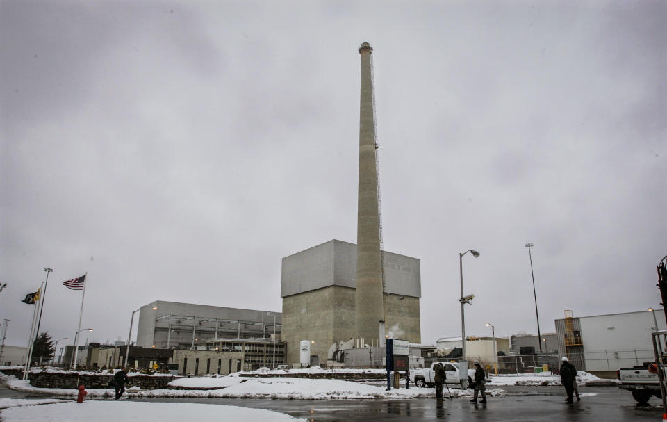 FILE - This photo shows the Oyster Creek nuclear plant and the large square structure that houses the reactor in Lacey Township, N.J., Feb. 25, 2010. For the second time in as many months, the U.S. Nuclear Regulatory Commission has fined the owners of the former New Jersey nuclear power plant for security-related violations. The agency on Wednesday, jan. 26, 2022 said it fined Holtec Decommissioning International $50,000 for security violations at the former Oyster Creek nuclear power plant in Lacey Township. (AP Photo/Mel Evans, File)