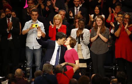 Britain's opposition Labour Party leader Ed Miliband kisses his wife Justine Thornton following his speech at the Labour Party's annual conference in Manchester, northern England September 23, 2014. REUTERS/Darren Staples