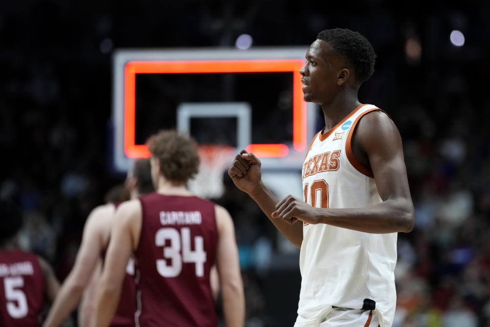 Texas guard Sir'Jabari Rice celebrates at the end of a first-round college basketball game against Colgate in the NCAA Tournament, Thursday, March 16, 2023, in Des Moines, Iowa. (AP Photo/Charlie Neibergall)