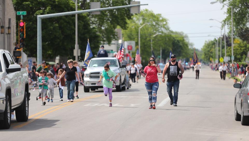 Participants walk and ride during the Memorial Day parade Monday May 31, 2021 on Main Street in Fond du Lac, Wis. Doug Raflik/USA TODAY NETWORK-Wisconsin
