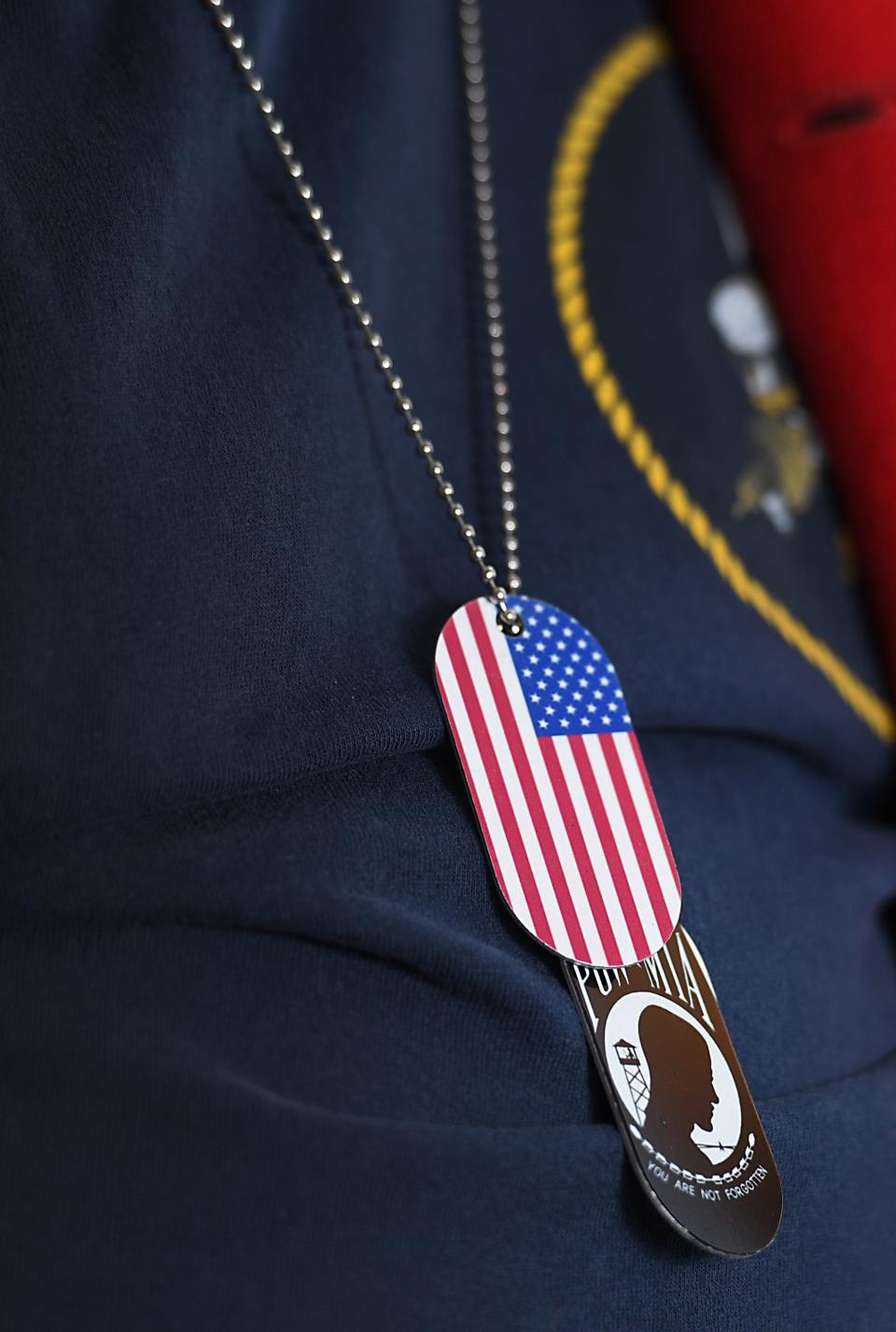 Veterans at the American Legion Post 28 in Spartanburg on Nov. 5, 2022.  Robert Justice, who served in the U.S. Navy Seabees, fought in WWII. Here, he wears dog tags in honor of the American flag and POW/MIA.