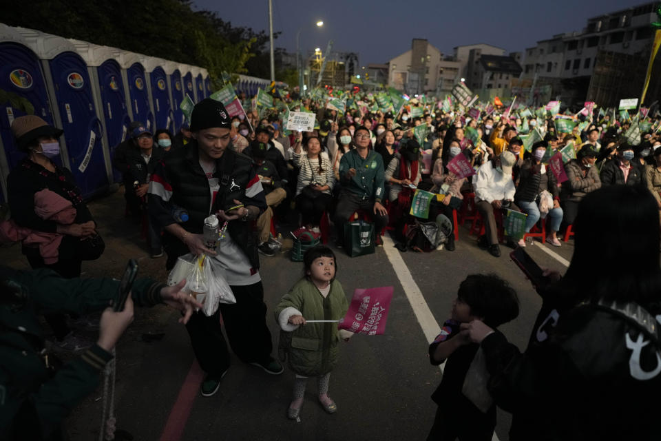 Supporters of the Democratic Progressive Party presidential candidate Lai Ching-te, who also goes by William, attend a rally in southern Taiwan's Tainan city on Friday, Jan. 12, 2024 ahead of the presidential election on Saturday. (AP Photo/Ng Han Guan)