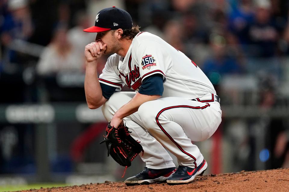 Braves reliever Jacob Webb reacts after hitting Kevin Pillar with a pitch.