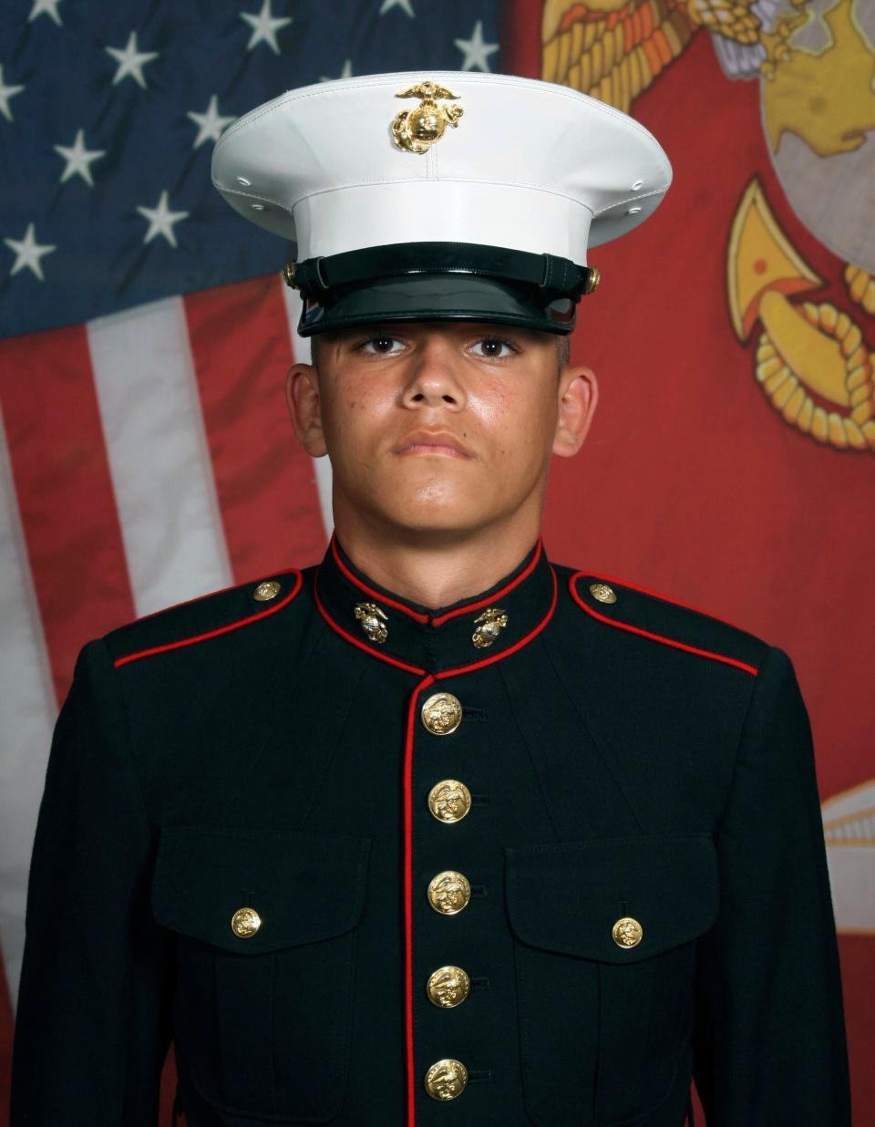 This undated photo released by the 1st Marine Division, Camp Pendleton/U.S. Marines shows Marine Corps Lance Cpl. Kareem M. Nikoui, 20, of Norco, Calif.