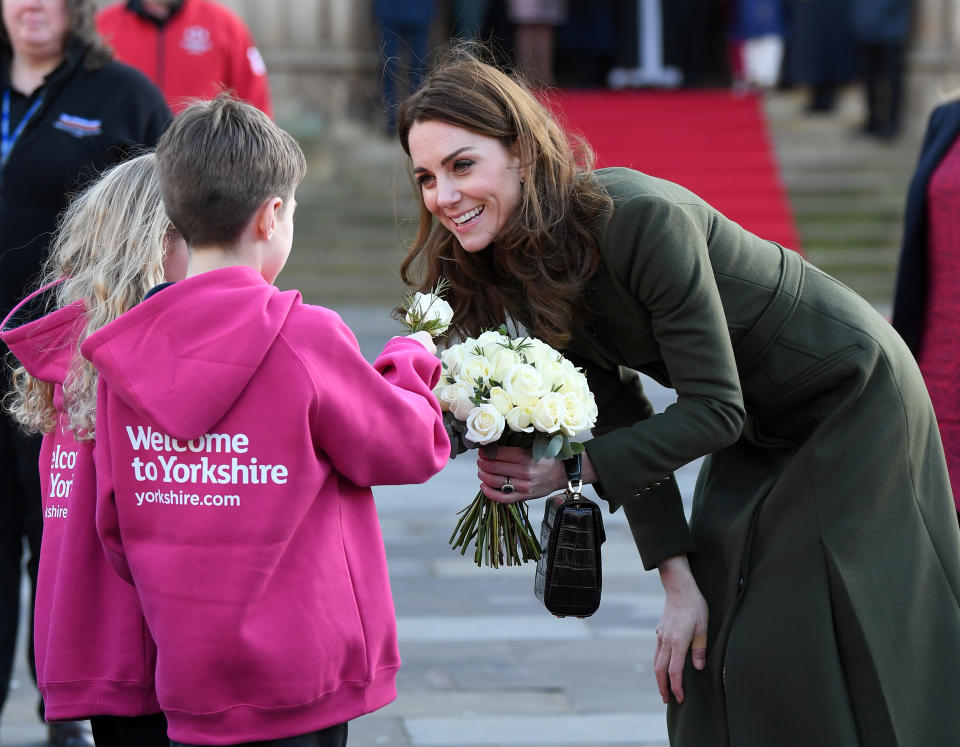 BRADFORD, ENGLAND - JANUARY 15: Catherine, Duchess of Cambridge accompanied by Prince William, Duke of Cambridge meets members of the public outside City Hall during their visit of Bradford on January 15, 2020 in Bradford, United Kingdom. (Photo by Karwai Tang/WireImage)