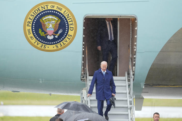 U.S. President Joe Biden walks down the steps of Air Force One upon arrival at Marine Corps Air Station Iwakuni, western Japan, Thursday, May 18, 2023, en route to Hiroshima for the Group of Seven nations' summit that starts Friday. (AP Photo/Hiro Komae)