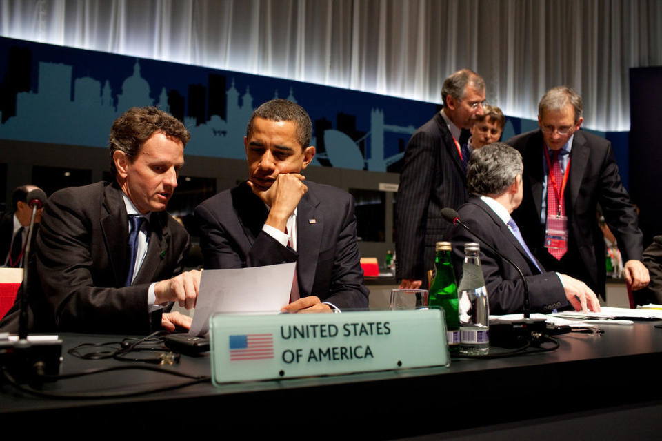 Obama confers with U.S. Treasury Secretary Timothy Geithner during the G-20 Summit on April 2, 2009, at the ExCel Centre in London.