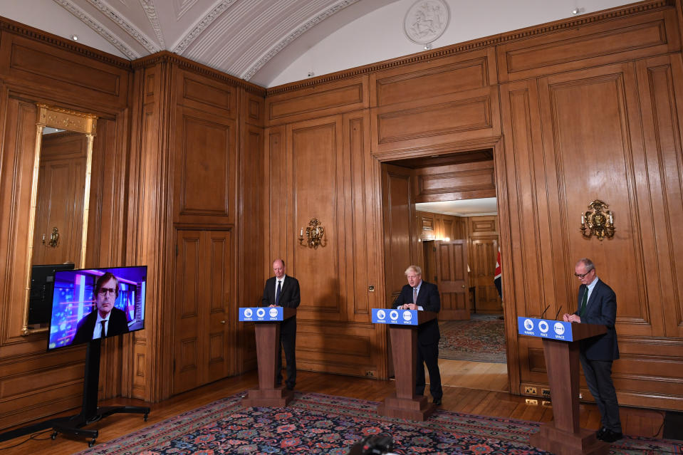 (left to right) Chief Medical Officer Professor Chris Witty, Prime Minister Boris Johnson and Chief Scientific Adviser Sir Patrick Vallance during a virtual press conference at Downing Street, London, following the announcement that the legal limit on social gatherings is set to be reduced from 30 people to six. The change in the law in England will come into force on Monday as the Government seeks to curb the rise in coronavirus cases.