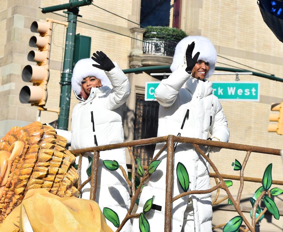 TLC's T-Boz and Chilli stayed cozy in all white while riding on the Splashing Safari Adventure float.