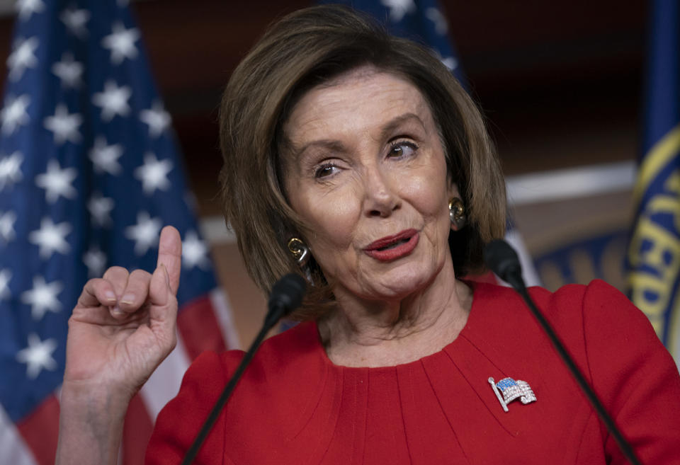 Speaker of the House Nancy Pelosi, D-Calif., talks to reporters on the morning after the first public hearing in the impeachment probe of President Donald Trump on his effort to tie U.S. aid for Ukraine to investigations of his political opponents, on Capitol Hill in Washington, Thursday, Nov. 14, 2019. Pelosi says the president's actions in the impeachment inquiry amount to "bribery." (AP Photo/J. Scott Applewhite)