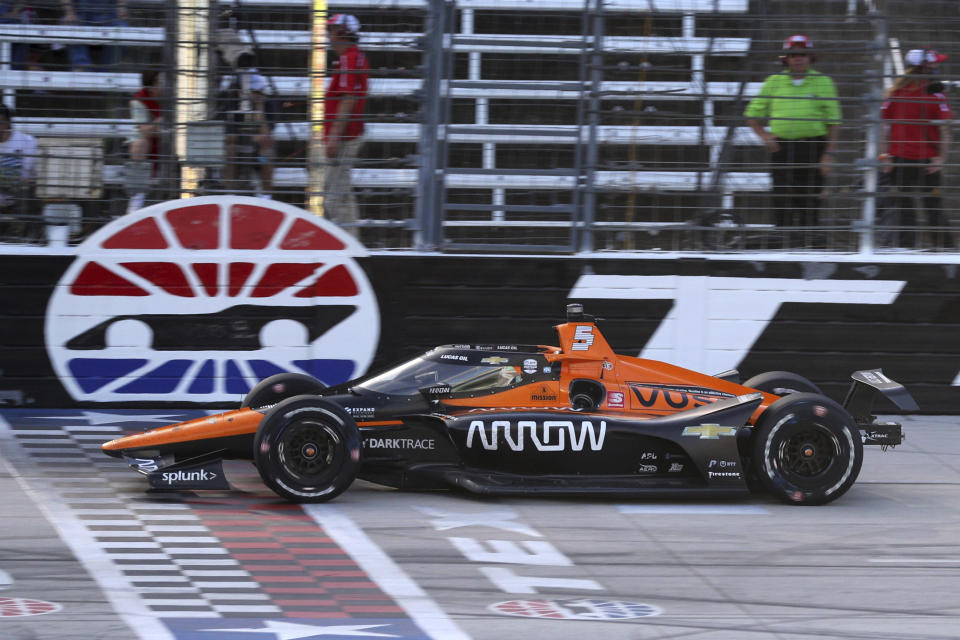 Pato O'Ward makes his way down the front stretch during an IndyCar Series auto race at Texas Motor Speedway on Sunday, May 2, 2021, in Fort Worth, Texas. (AP Photo/Richard W. Rodriguez)