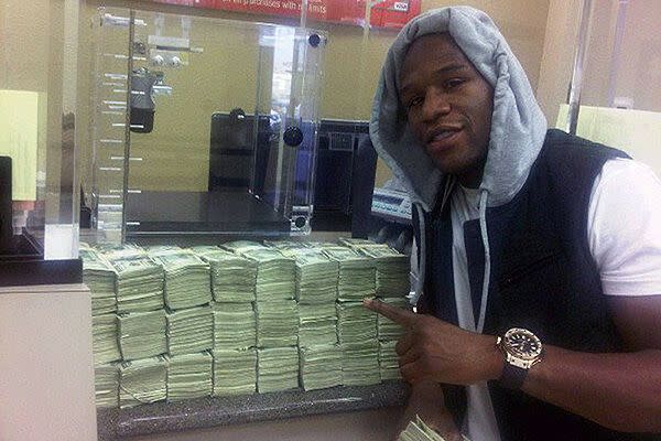 Mayweather depositing $1.2 million at the bank.