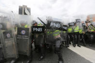 <p>Police fire tear gas and rubber bullets to disperse opposition protesters on Francisco Fajardo Highway in Caracas, June 7, 2016. (AP/Fernando Llano) </p>