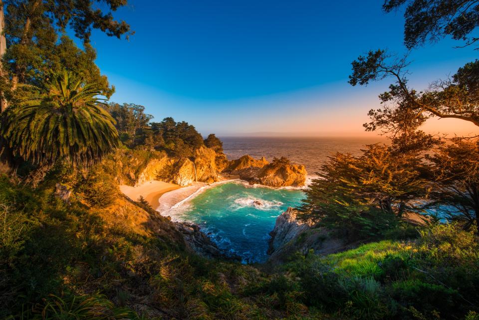 A view of McWay Falls along a beach coast along the Big Sur - Credit: AP