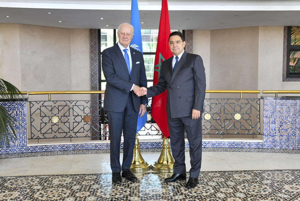 In this image released by Morocco's Foreign Ministry, Morocco's Foreign Minister Nasser Bourita, right, welcomes UN Secretary General's Personal Envoy for Western Sahara, Staffan de Mistura, as he visits the region, in Rabat, Morocco, Friday, Sept. 8, 2023. (AP Photo via Morocco Foreign Ministry)