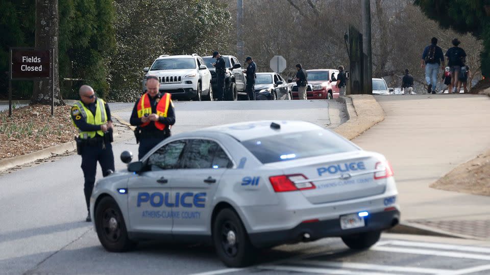 Athens-Clarke County police block traffic and investigate at the University of Georgia intramural fields in Athens on Thursday. - Joshua L. Jones/Online Athens/USA Today Network