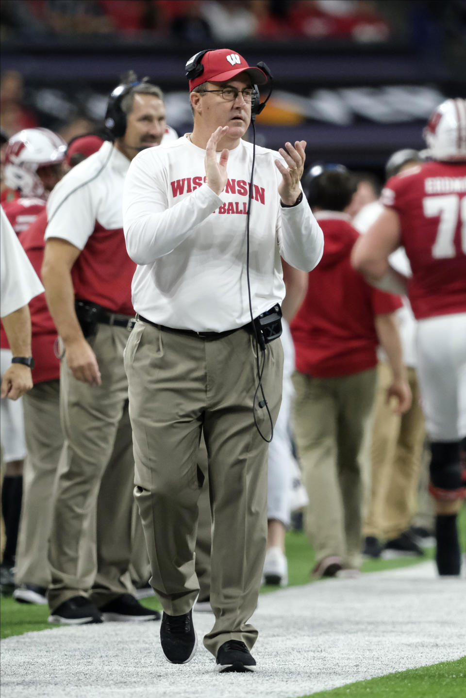 Wisconsin coach Paul Chryst watches from the sideline during the first half of the team's Big Ten championship NCAA college football game against Ohio State, Saturday, Dec. 7, 2019, in Indianapolis. (AP Photo/AJ Mast)