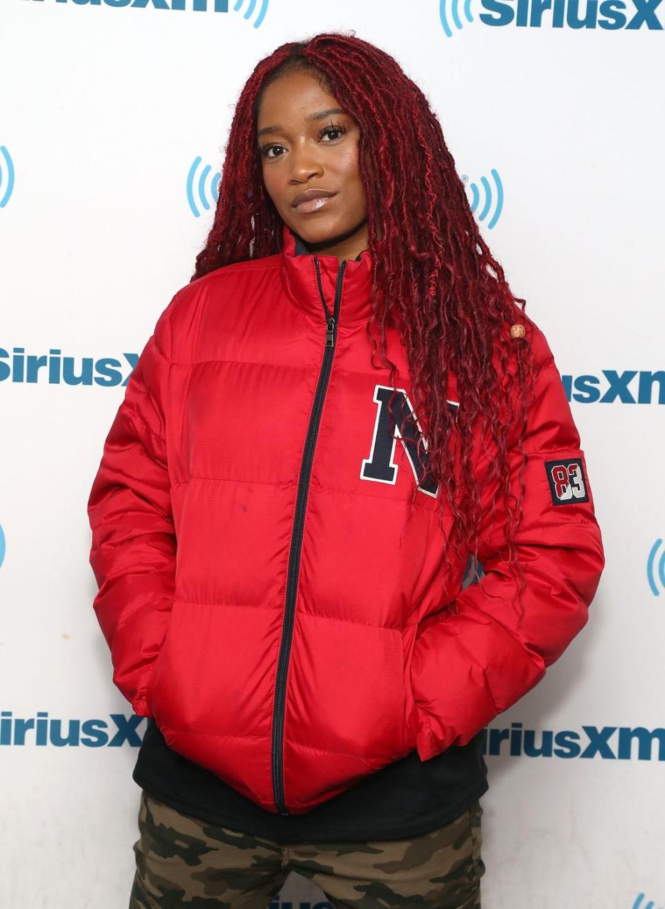 <p><strong>Keke Palmer</strong>'s pinkish-red locks make for a bold, attention-getting hair color. If you're not ready to commit, temporary dye is a great way to try out a bright shade like this. </p>