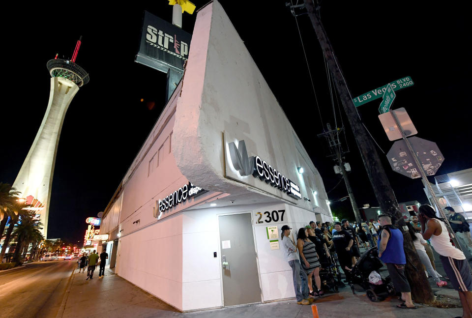 <p>Customers line up outside Essence Vegas Cannabis Dispensary as they wait for the midnight start of recreational marijuana sales to begin on June 30, 2017 in Las Vegas, Nev. (Photo: Ethan Miller/Getty Images) </p>