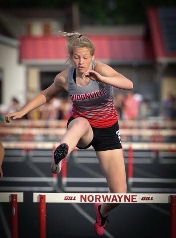 Loudonville's Corri Vermilya running in the 300 hurdles