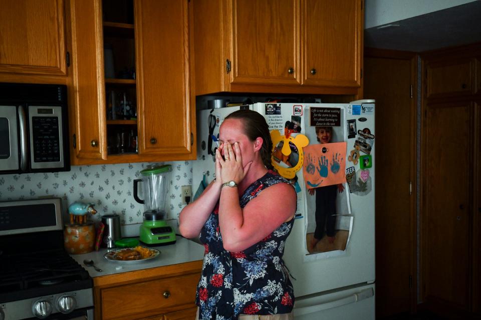Whitney Phinney reacts to realizing she prepaid for a day of preschool her son can't attend because he's sick. Money is tight, and the Phinneys are in the red every month.