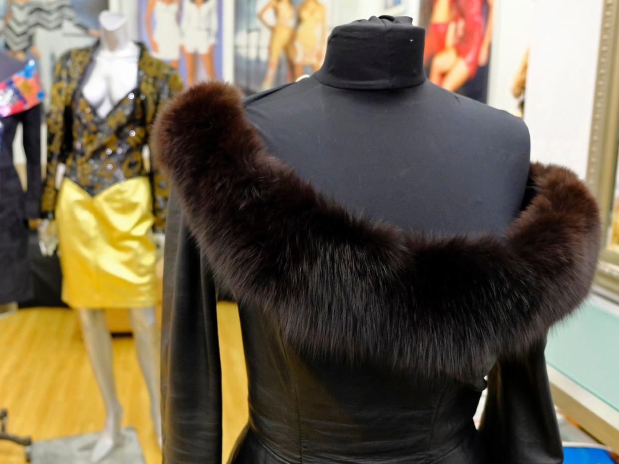 A vintage fox trimmed leather dress displayed in the basement of a store in San Francisco: AP