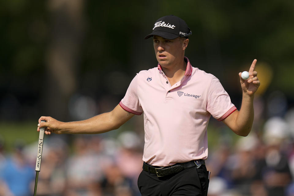 FILE - Justin Thomas celebrates after a birdie on the 17th hole during the final round of the PGA Championship golf tournament at Southern Hills Country Club, Sunday, May 22, 2022, in Tulsa, Okla. His 3-wood onto the green at the 17th led to birdie that enabled him to win his second major. (AP Photo/Eric Gay, File)