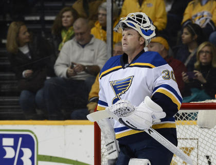 St. Louis Blues goalie Martin Brodeur (30) looks at the scoreboard during a timeout in the first period of an NHL hockey game against the Nashville Predators Thursday, Dec. 4, 2014, in Nashville, Tenn. (AP Photo/Mark Zaleski)