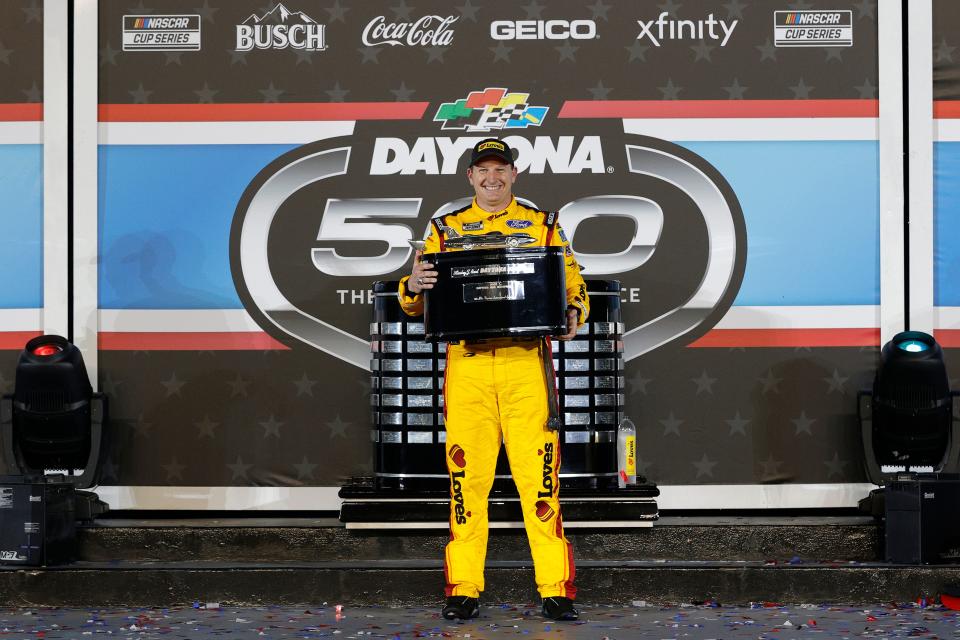 Michael McDowell celebrates winning the 2020 Daytona 500 at Daytona International Speedway.