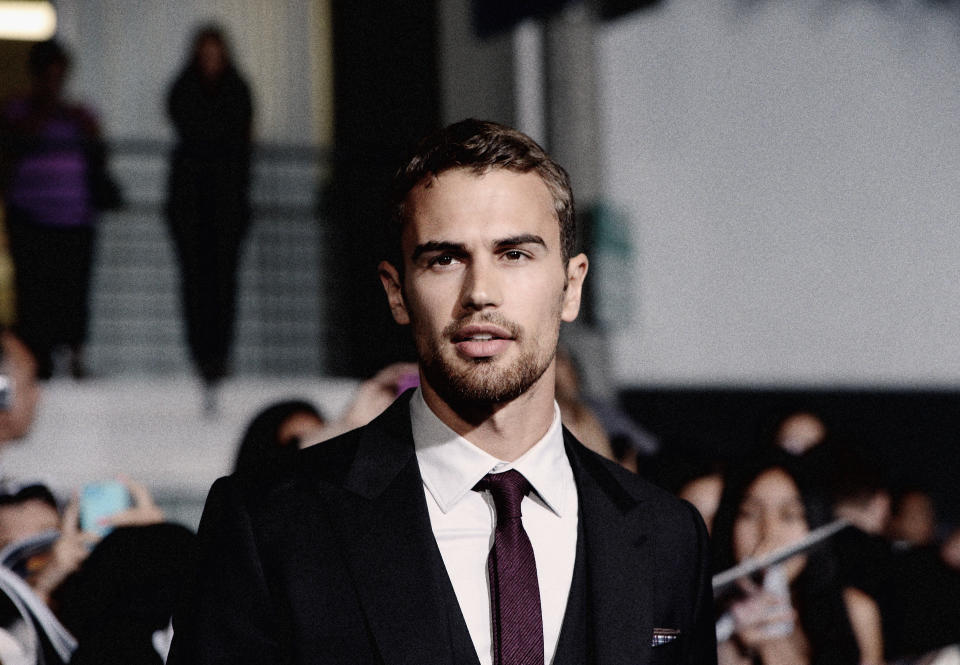 LOS ANGELES, CA - MARCH 18:  (EDITORS NOTE: This image was processed using digital filters)  Actor Theo James attends Summit Entertainment's 'Divergent' Premiere at Regency Bruin Theatre on March 18, 2014 in Los Angeles, California.  (Photo by Jason Kempin/Getty Images)